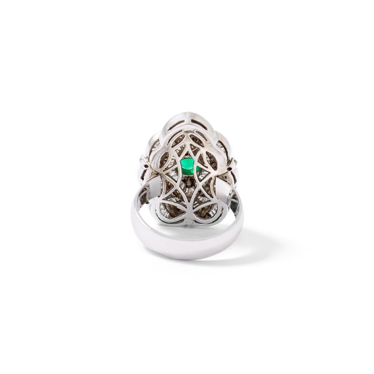 0.98 carat Natural Colombian Emerald mounted on a Diamond pave white gold Ring.
