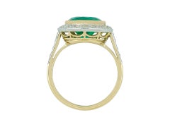 Colombian Emerald and diamond target ring, circa 1915
