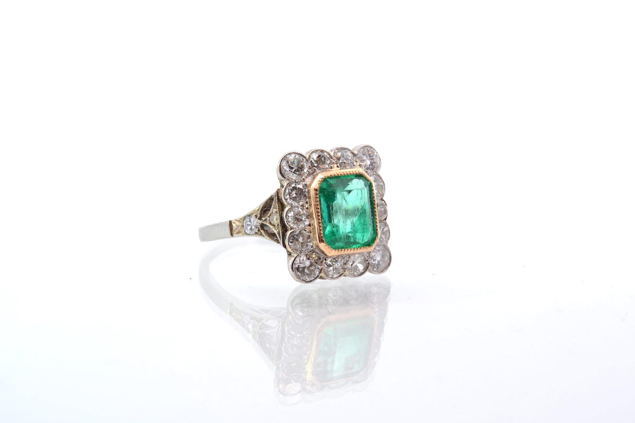 Emerald Cut Colombian emerald and diamonds ring in 18k gold