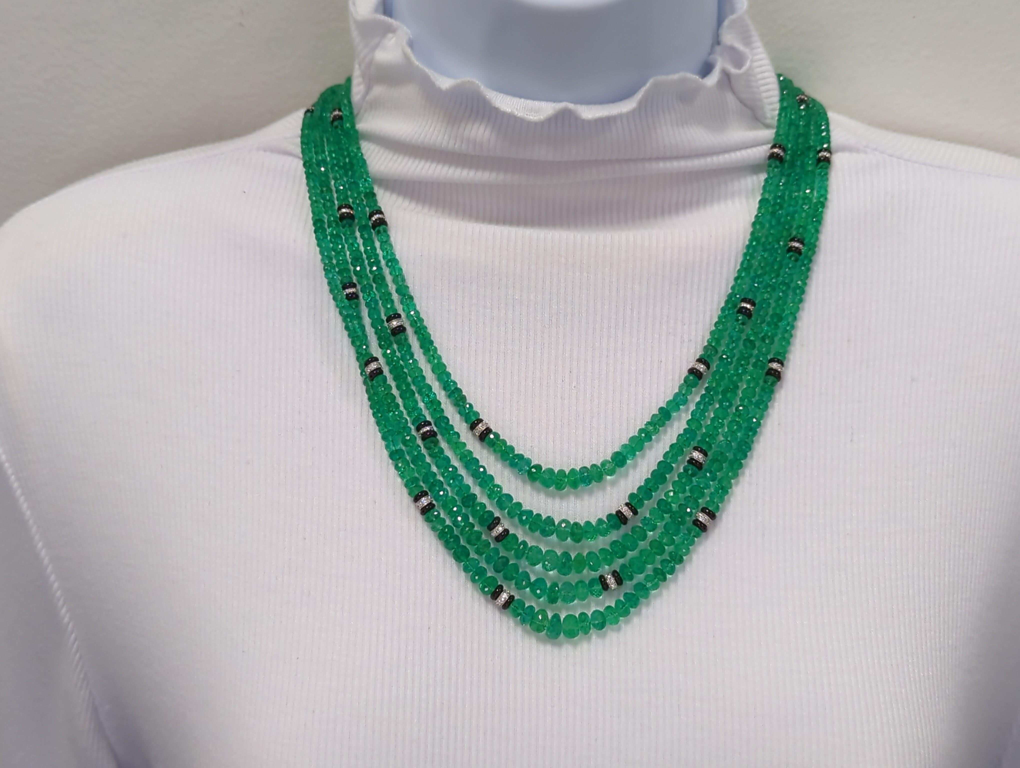 Gorgeous 385.00 ct. Colombian emerald beads with good quality, white, and bright diamond rounds.  Handmade in 18k white gold.  Total of 5 strands.  Length of shortest strand is 23