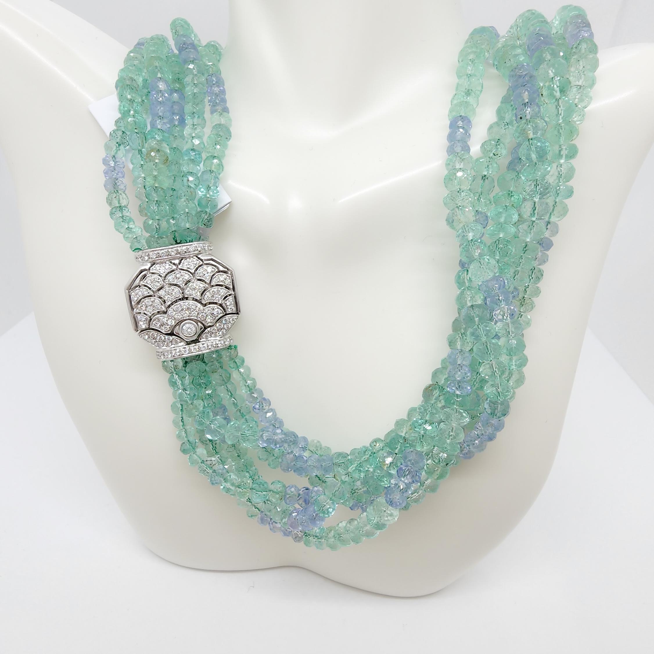 Absolutely gorgeous 825 ct. of Colombian emerald and Ceylon blue sapphire beads with an 18k white gold and diamond fish design clasp.  This necklace is stunning and substantial.  Total of 6 nested strands.  Clasp is unique and well made.