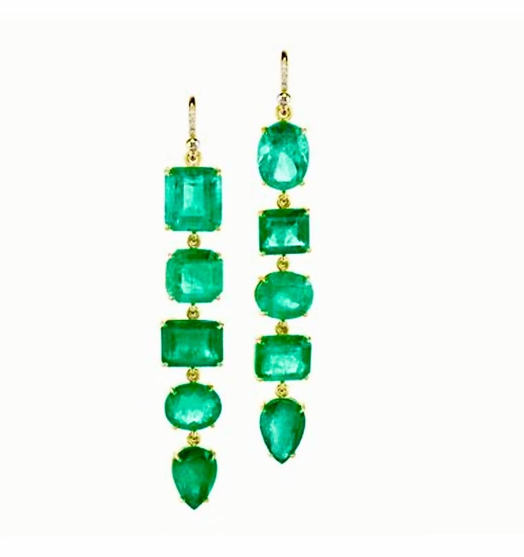 Ships 4 weeks from the date of order placement. 
A pair of one-of-a-kind dangle 14k yellow gold earrings set with a gorgeous approx. 10.00-11.00 carats assortment of natural Colombian emeralds!
 **These incredible earrings are available for