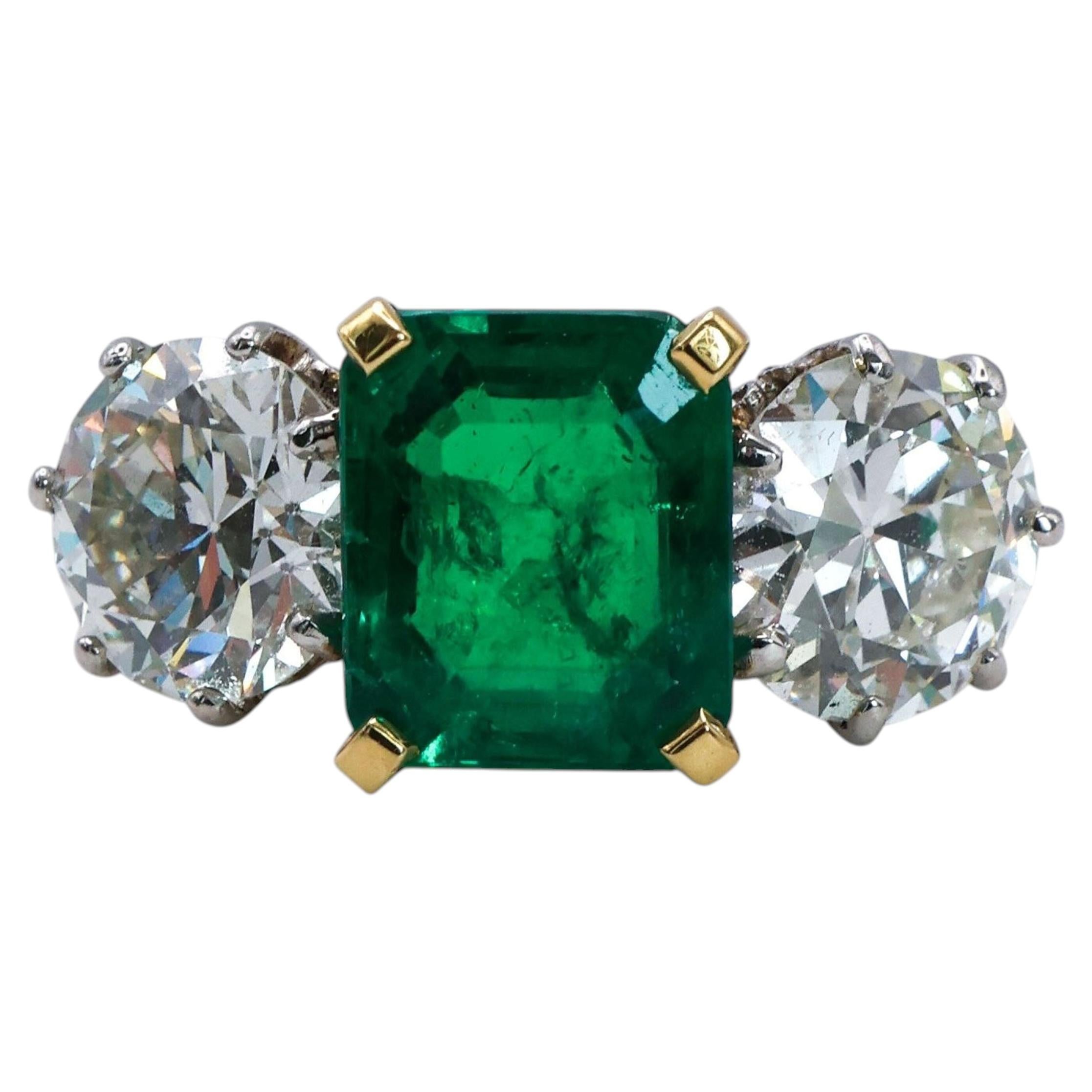 Colombian Emerald, Diamond, 18 Karat Gold and Platinum Three Stone Ring For Sale
