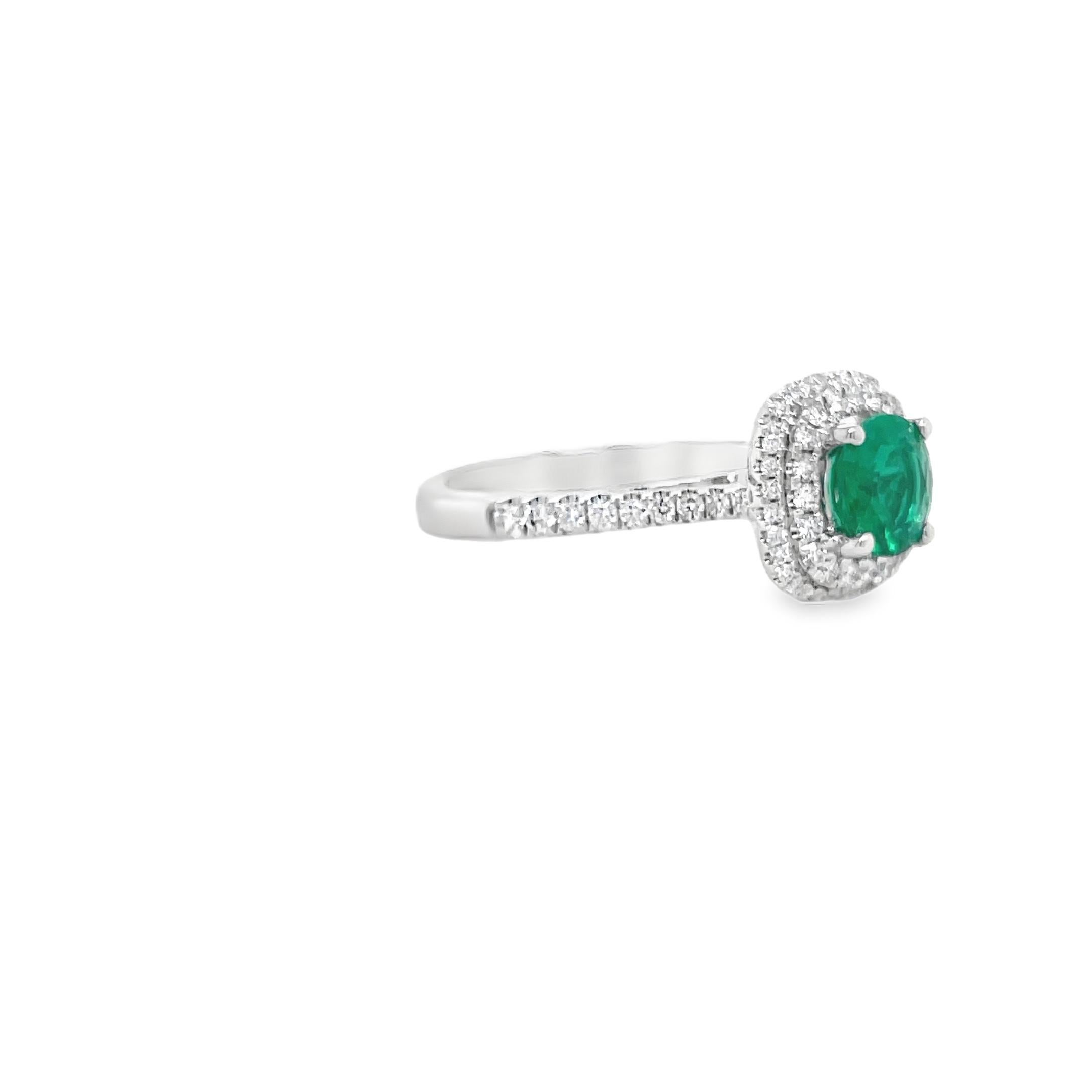Contemporary Colombian Emerald & Diamond Double Halo Ring in White Gold For Sale