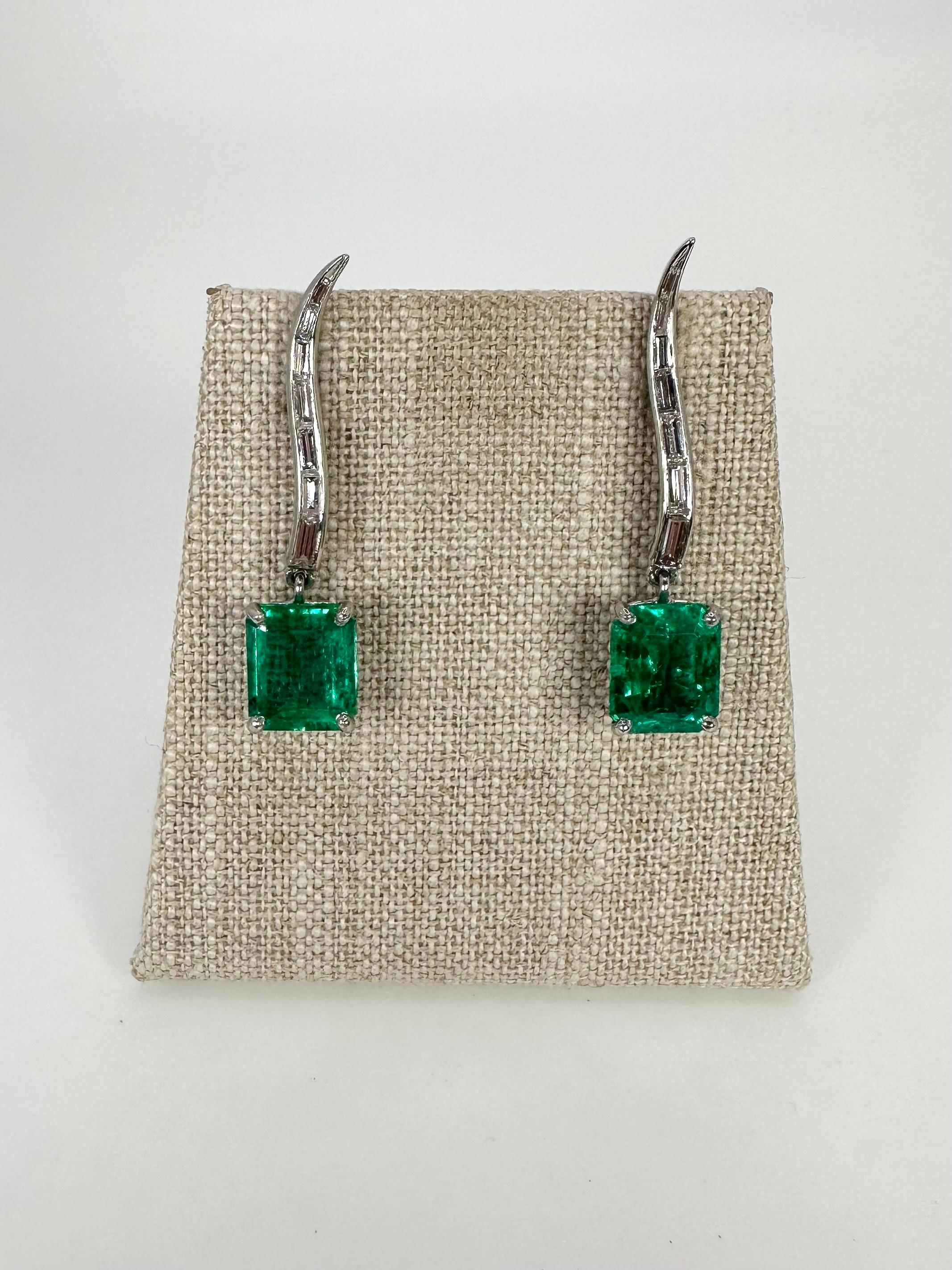 Colombian emeralds paired with natural diamonds in platinum.The earrings are luxuriously long with incredible sparkle and elegance. This is a rare find as the emeralds are certified Colombian emeralds as per GIA. (Refer to all photos)

GRAM WEIGHT:
