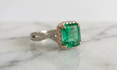 Colombian Emerald & Diamond Halo Crossover Ring – GIA Certified – 2.31 Carats
