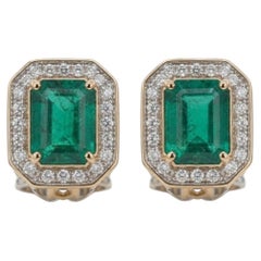 Colombian Emerald & Diamond Halo Earrings in 18 Karat Gold 14.01 Carats
