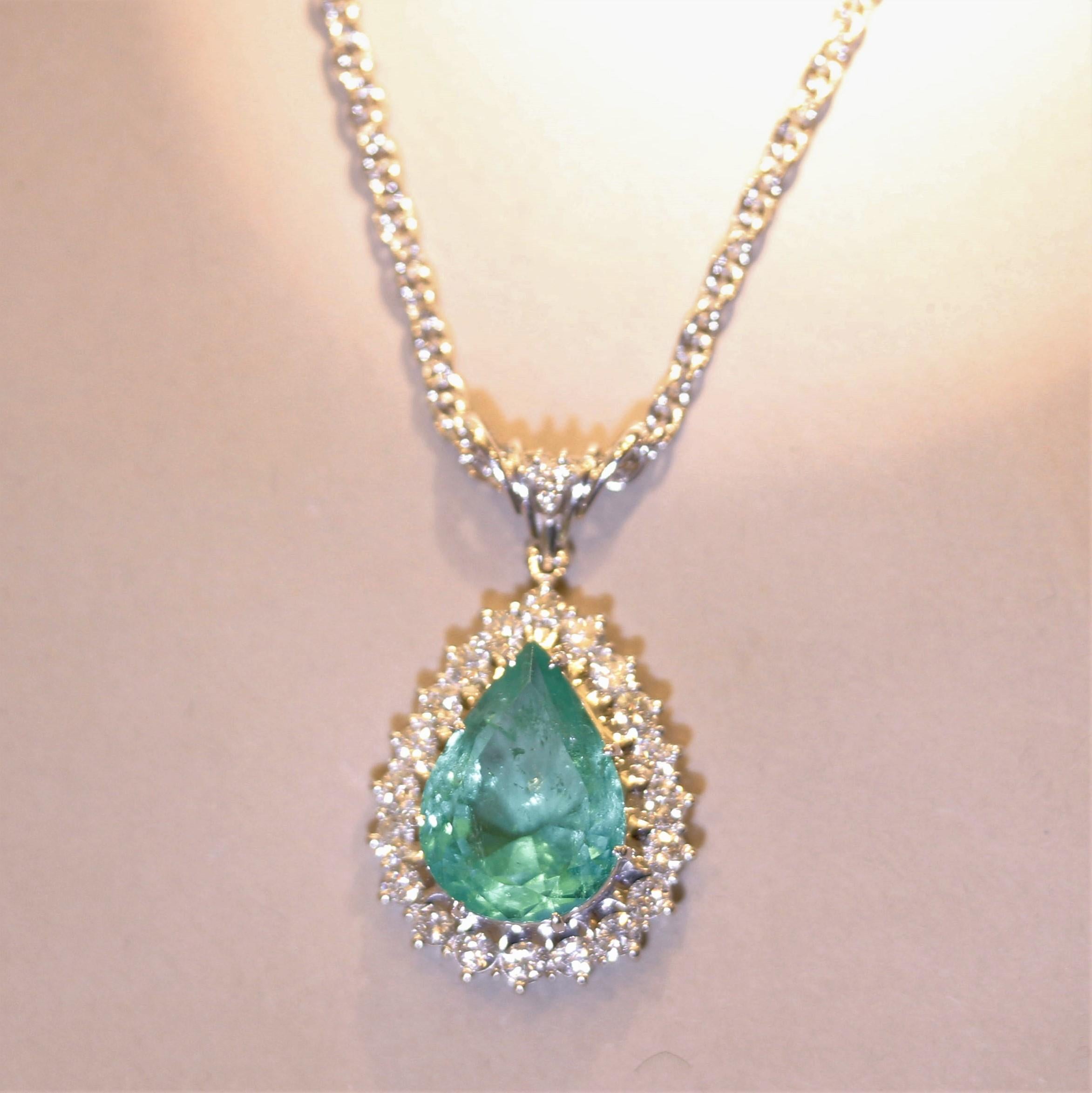 A fine GIA certified Colombian emerald weighing 10.38 carats! The pear-shaped gem has a luscious vivid green color and is free of major inclusions usually found in emeralds. This allows the stone's natural brilliance to come out and its color to
