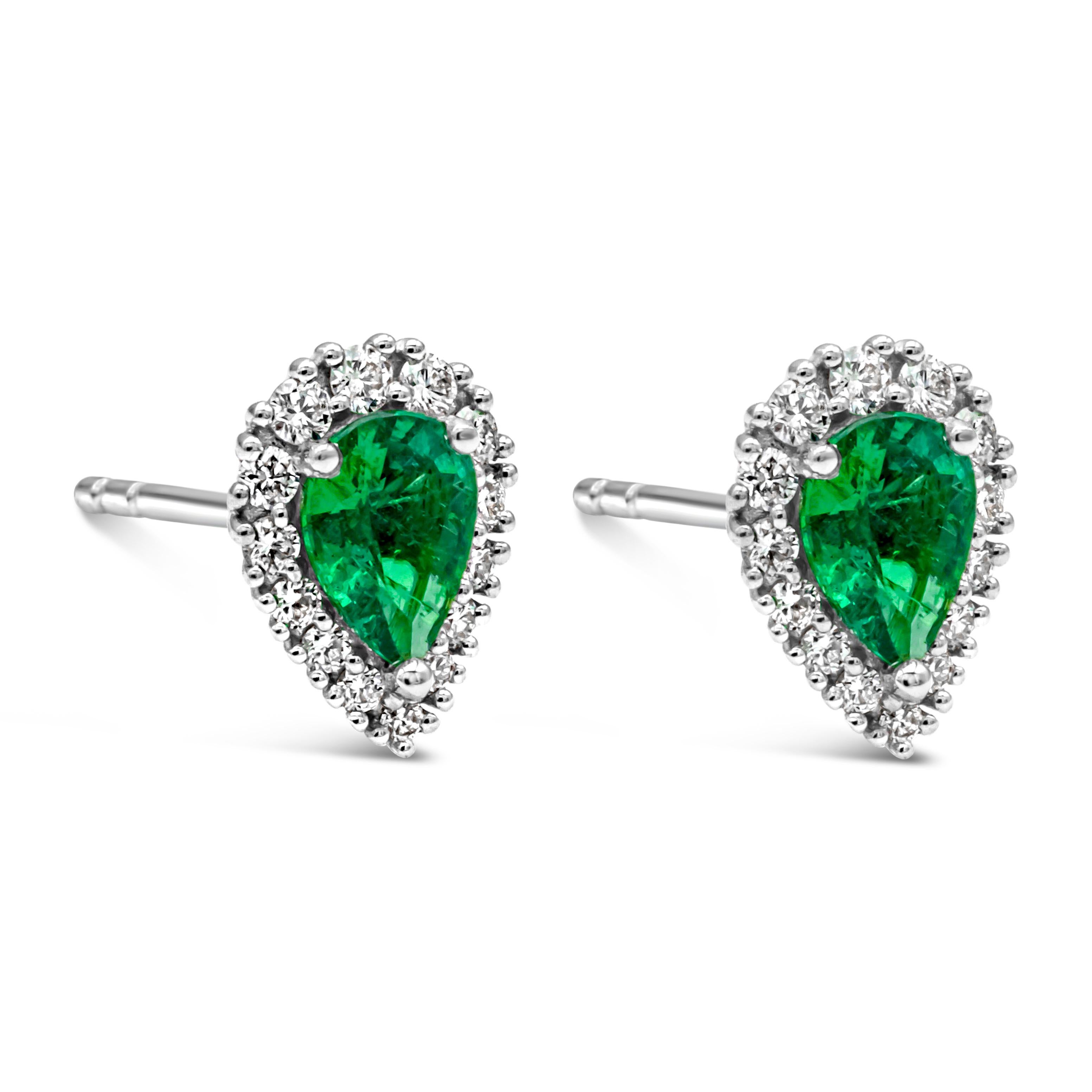 Contemporary Colombian Emerald & Diamond Halo Stud Earrings For Sale