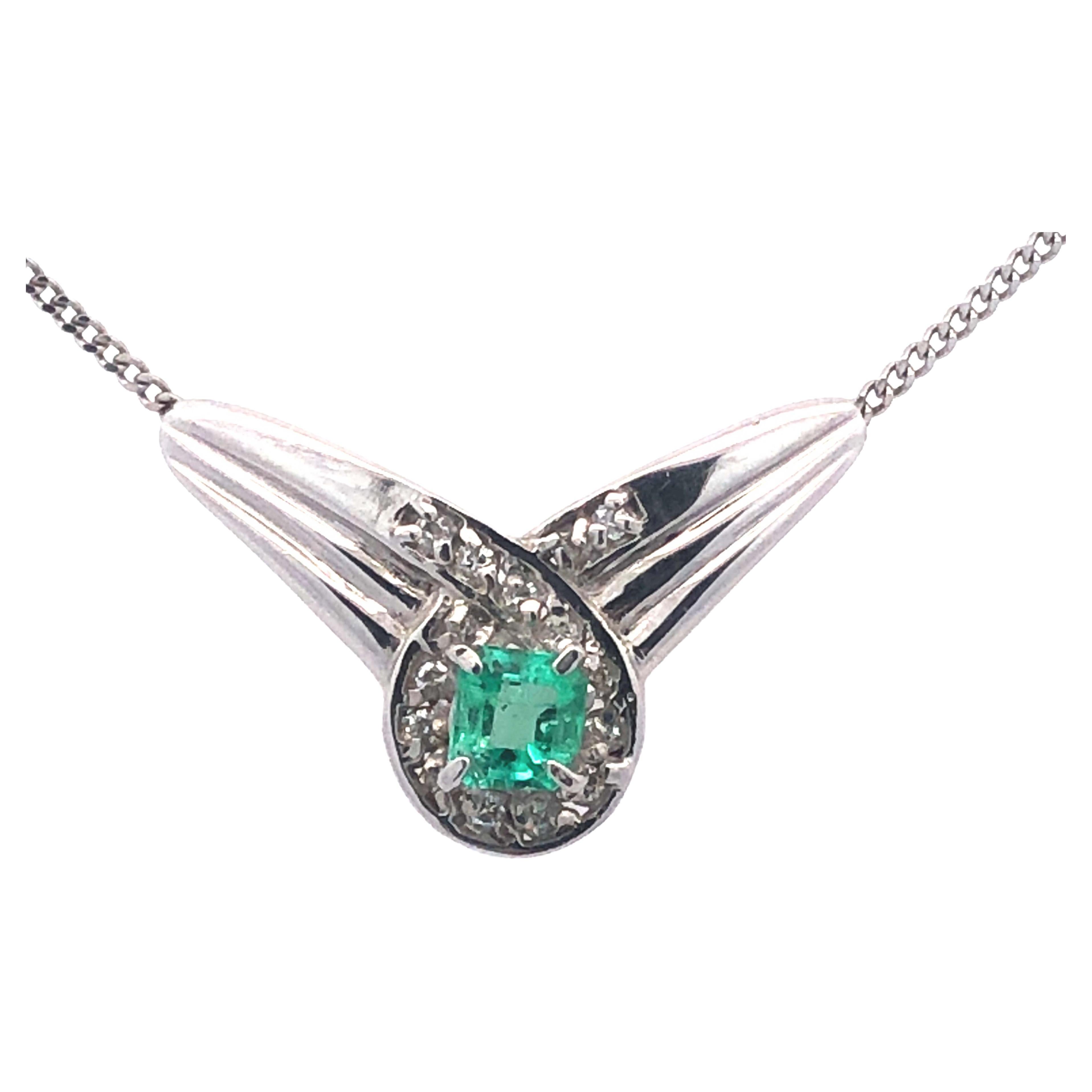 Colombian Emerald & Diamond Halo Twist Necklace in Platinum 