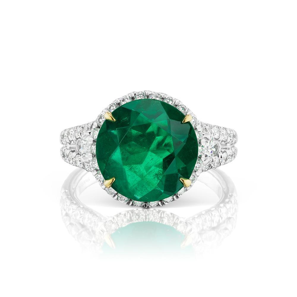 COLOMBIAN EMERALD
& DIAMOND RING
A truly spectacular colombian emerald of richest green set within a
sparkling menagerie of diamond shapes. Emerald is GRS certified.
Item: # 03044
Metal: 18k W
Lab: Grs
Color Weight: 3.92 ct.
Diamond Weight: 1.55 ct.