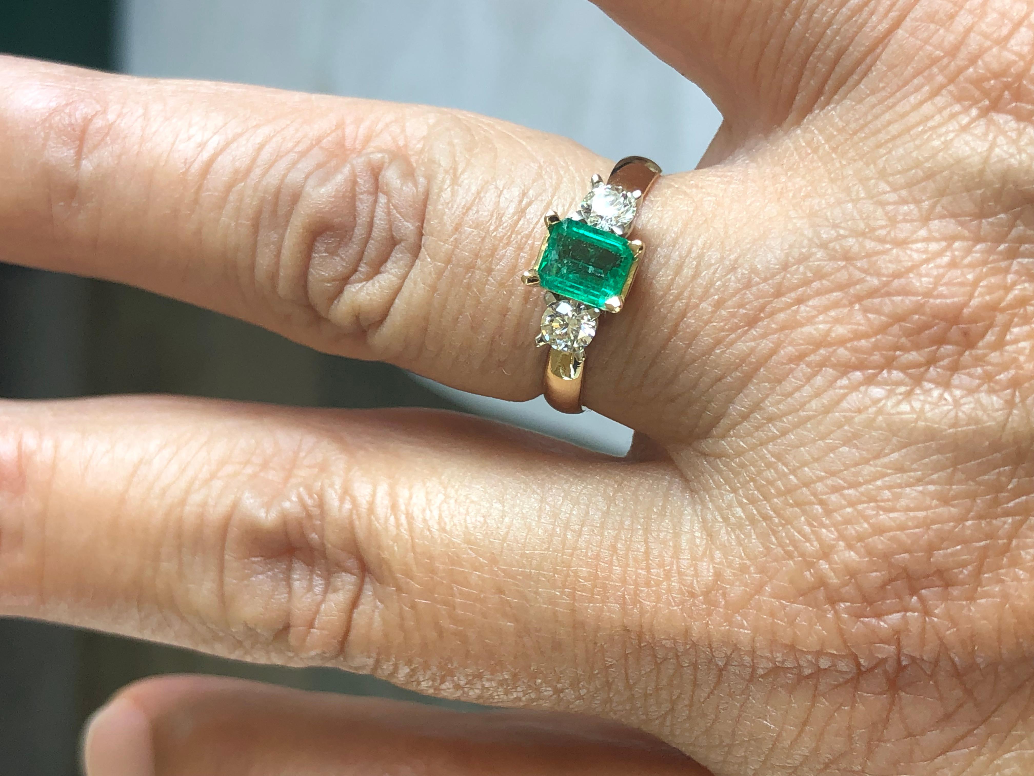 Contemporary Colombian Emerald Diamond Three-Stone Engagement Ring 18 Karat For Sale
