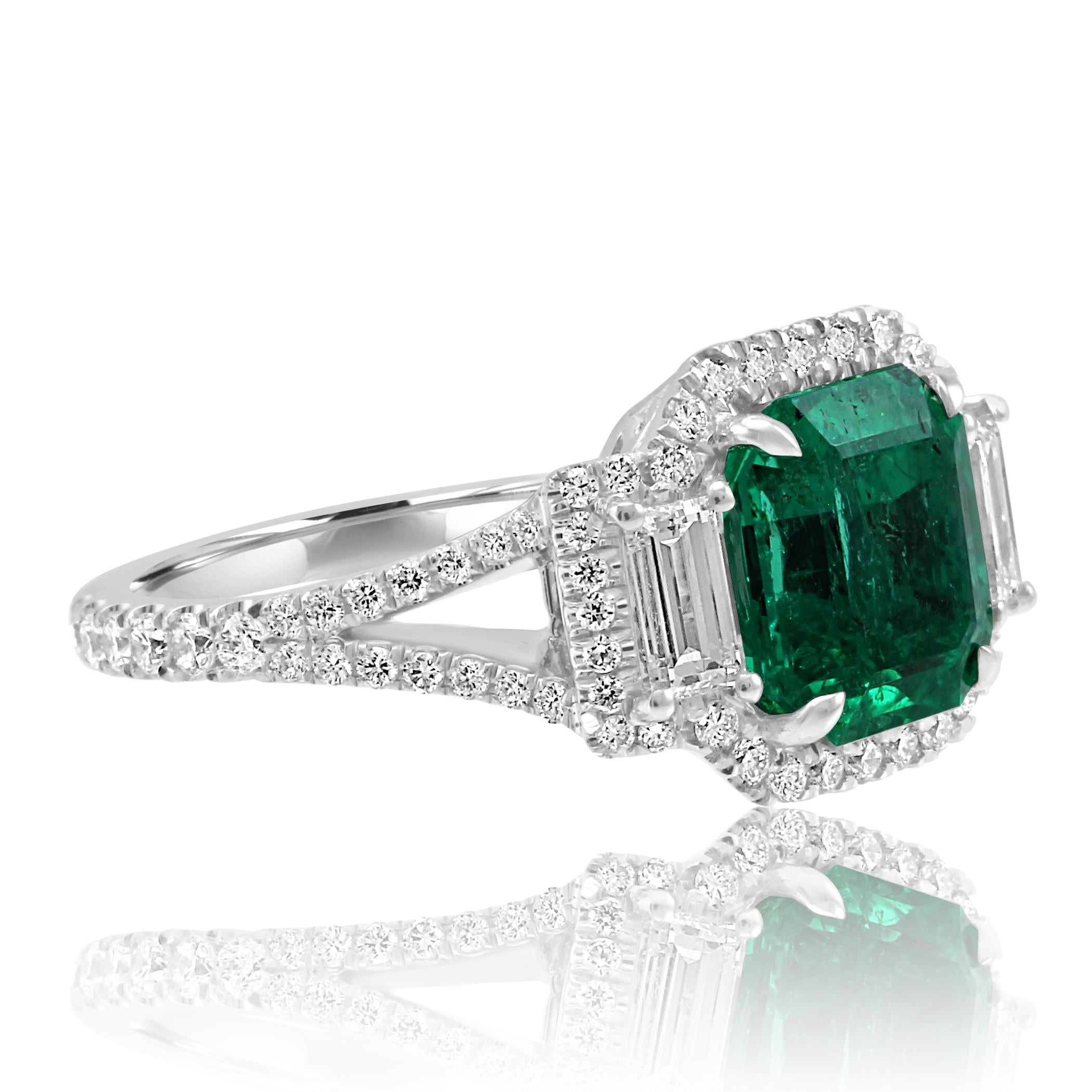 Contemporary Colombian Emerald Diamond Three-Stone Halo Fashion Cocktail White Gold Ring