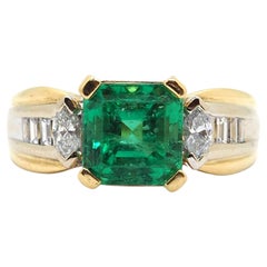 Anillo de oro de 18 quilates con diamantes esmeralda colombianos