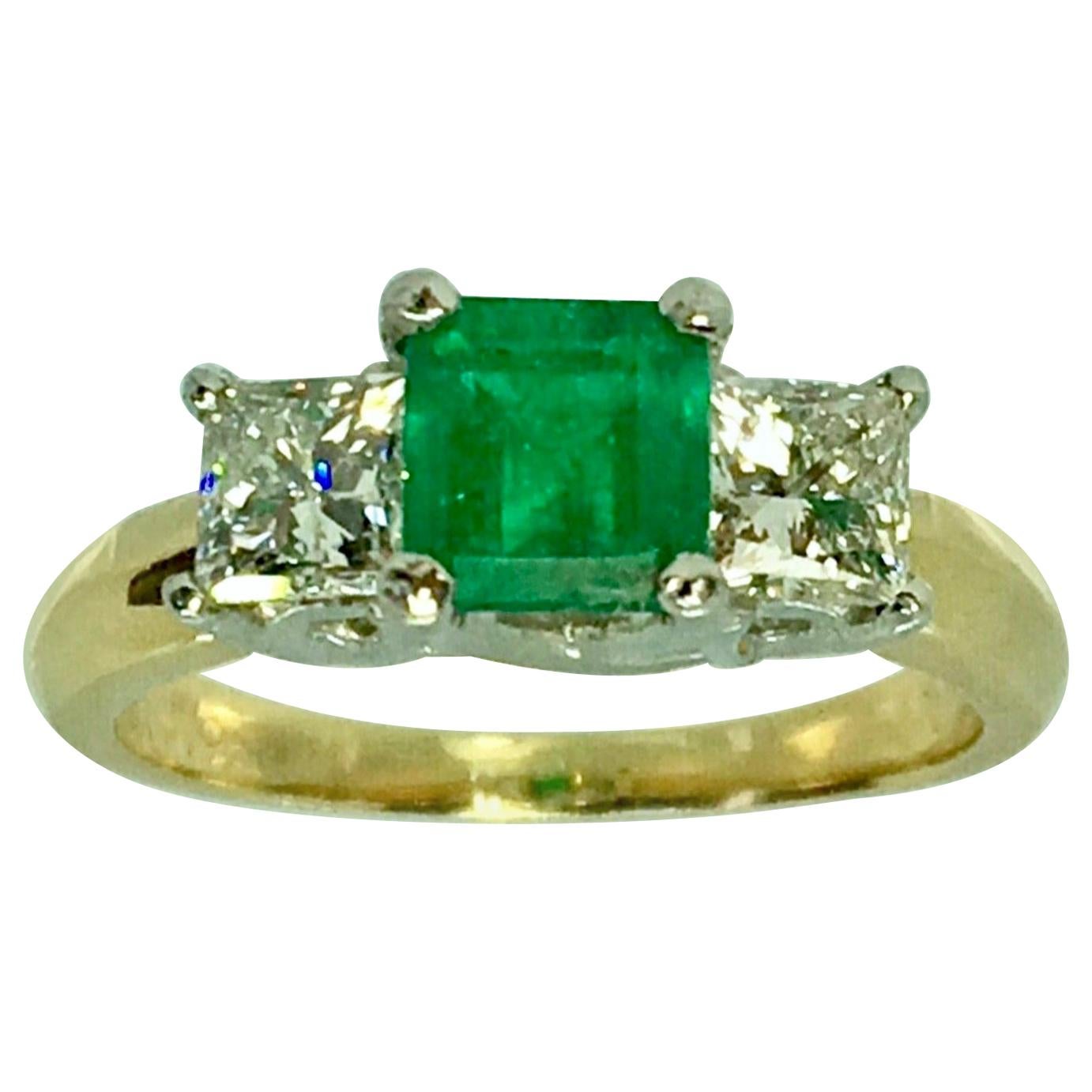 Colombian Emerald and Diamonds Platinum, 18 Karat Three-Stone Engagement Ring For Sale