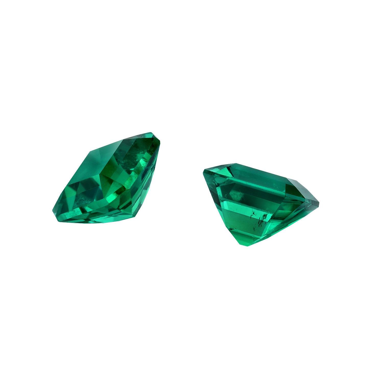 Exceptional pair of vivid green Muzo Colombia Emeralds weighing a total of 2.95 carats, offered loose and unmounted to a very exclusive gemstone collector. This pair showcases rare clarity, color and cut.
The GRS gem certificates and appendix