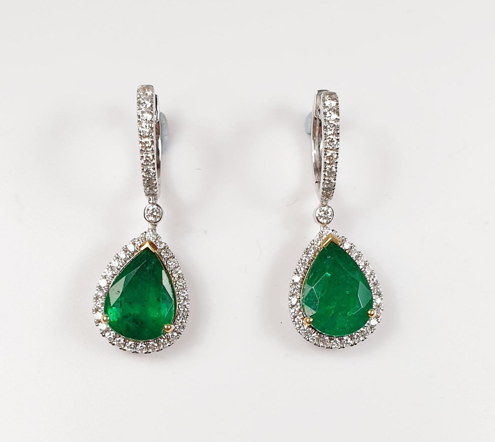 Pear Shape Colombian Emerald 6.60ct total  hoop Earrings with Diamonds earrings  and White Gold

Irama Pradera is a Young designer from Spain that searches always for the best gems and combines classic with contemporary mounting and styles.
She