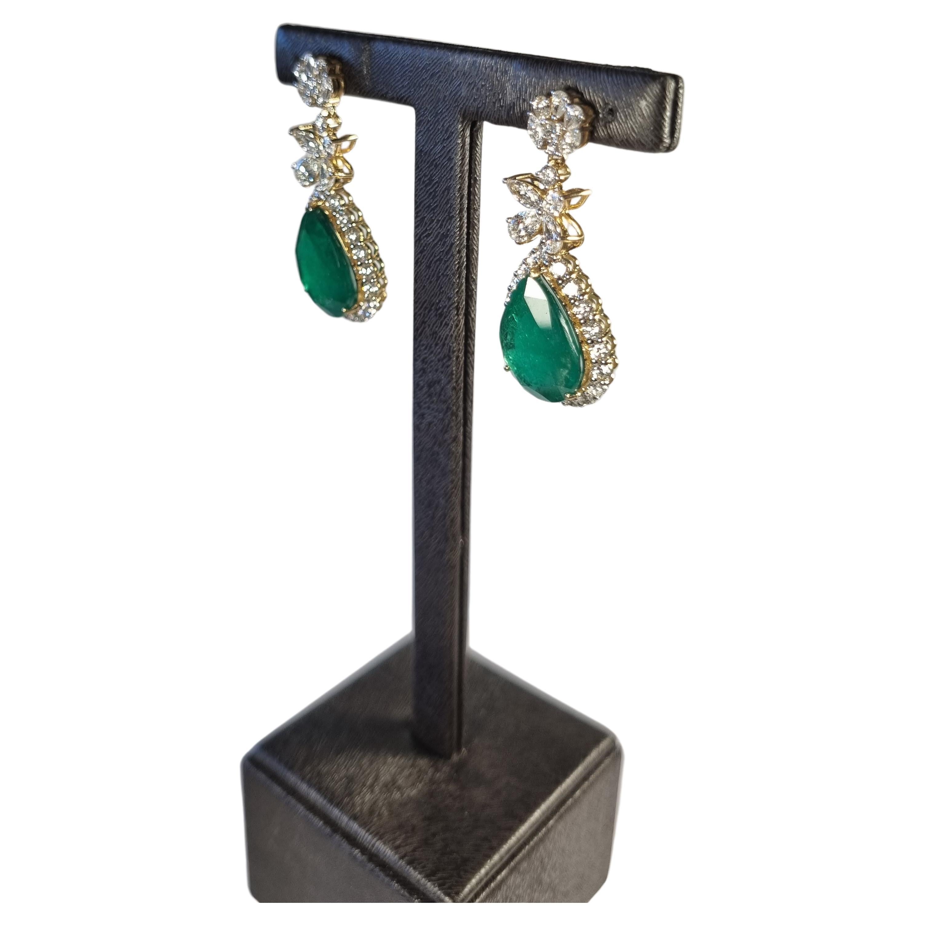 Colombian Emerald Earrings with Diamonds and Yellow Gold
Yellow Gold 10gr
Emerald 12.50ct.
Diamonds 180 total 2.4ct.
Total Weight 12.36gr

Irama Pradera is a Young designer from Spain that searches always for the best gems and combines classic with