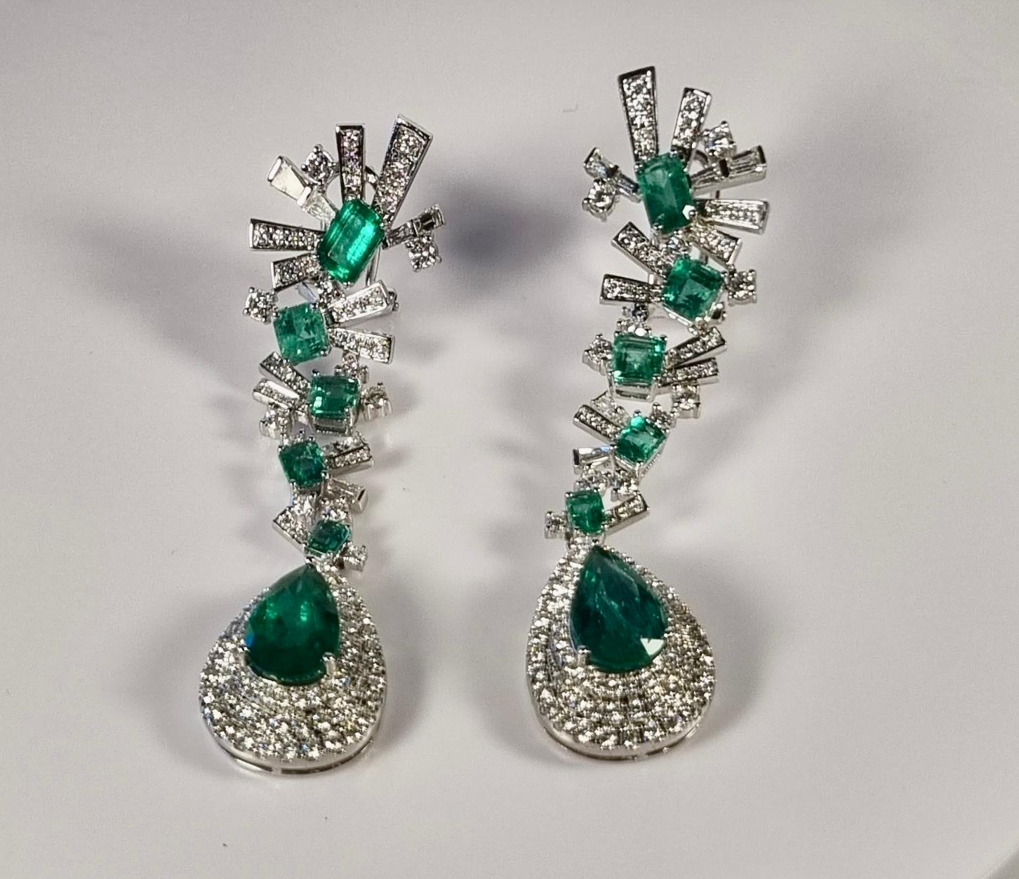 Colombian Emerald Earrings with Diamonds and Yellow Gold
Yellow Gold 10gr
Emerald 12.50ct.
Diamonds 180 total 2.4ct.
Total Weight 12.36gr

Irama Pradera is a Young designer from Spain that searches always for the best gems and combines classic with