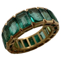 Colombian emerald eternity ring 18KT matte finish yellow gold