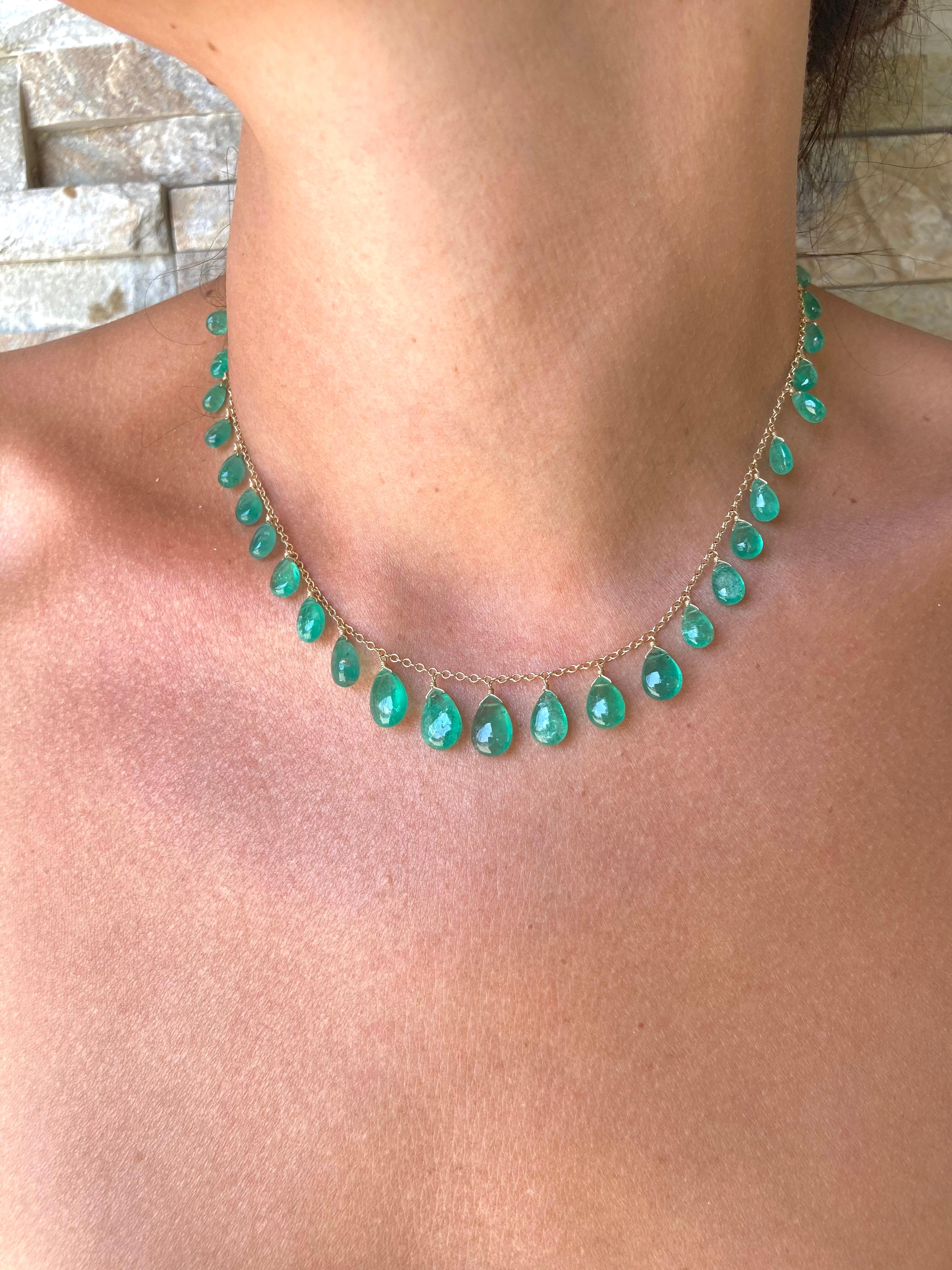 33 pear shape cabochon Colombian Emerald were carefully selected for their size and color to make this delicate necklace. Expected of Emeralds, they are slightly included,  but have that vibrant green color I look for when buying emeralds. Emerald