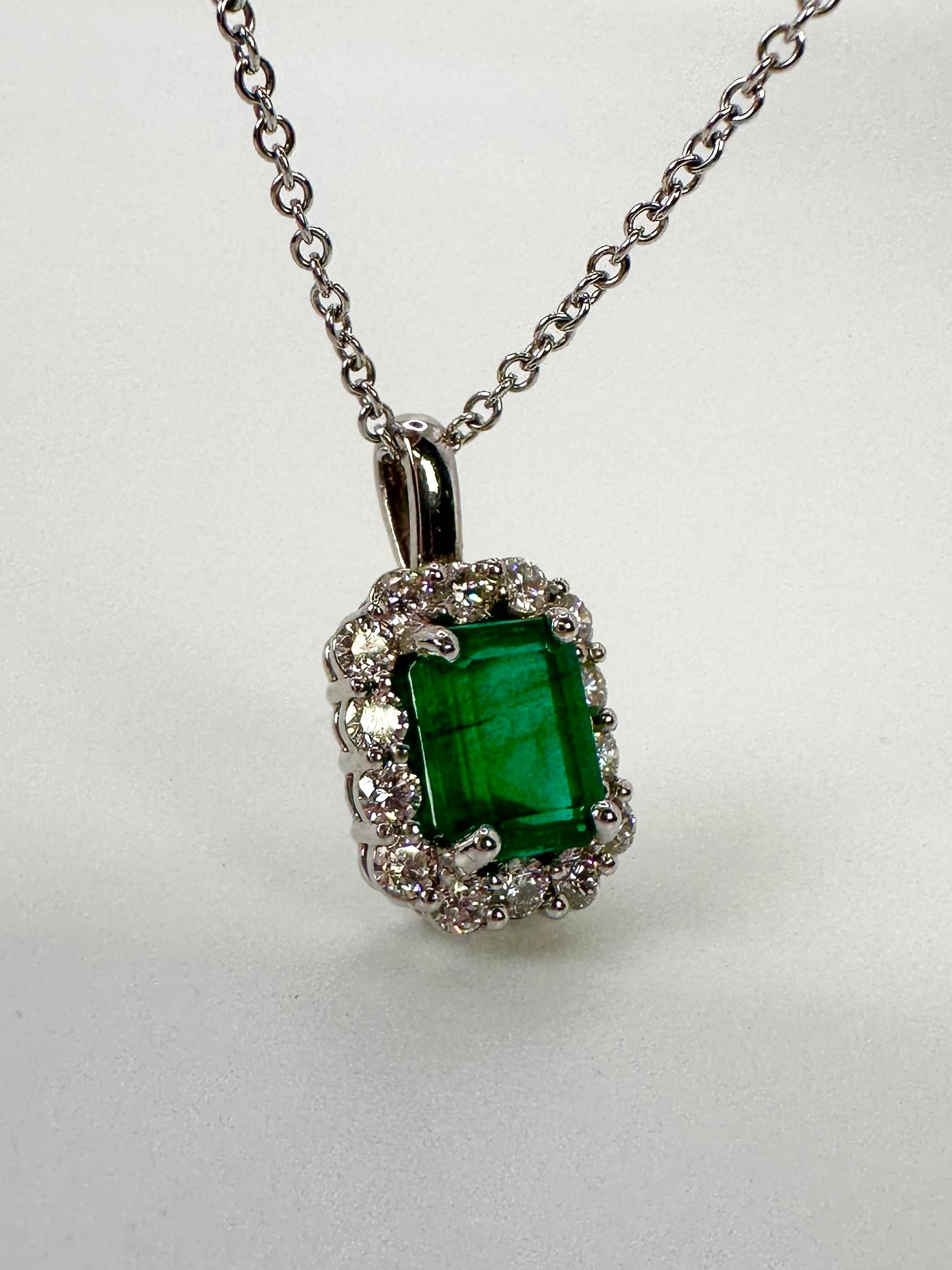 Rare Colombian certified emerald and diamond necklace in 14kt white gold. Absolutely stunning pendant necklace that looks both elegant and luxurious.

GRAM WEIGHT: 4.90gr
GOLD: 14KT gold
NATURAL EMERALD(S)
Clarity/Color: Moderately