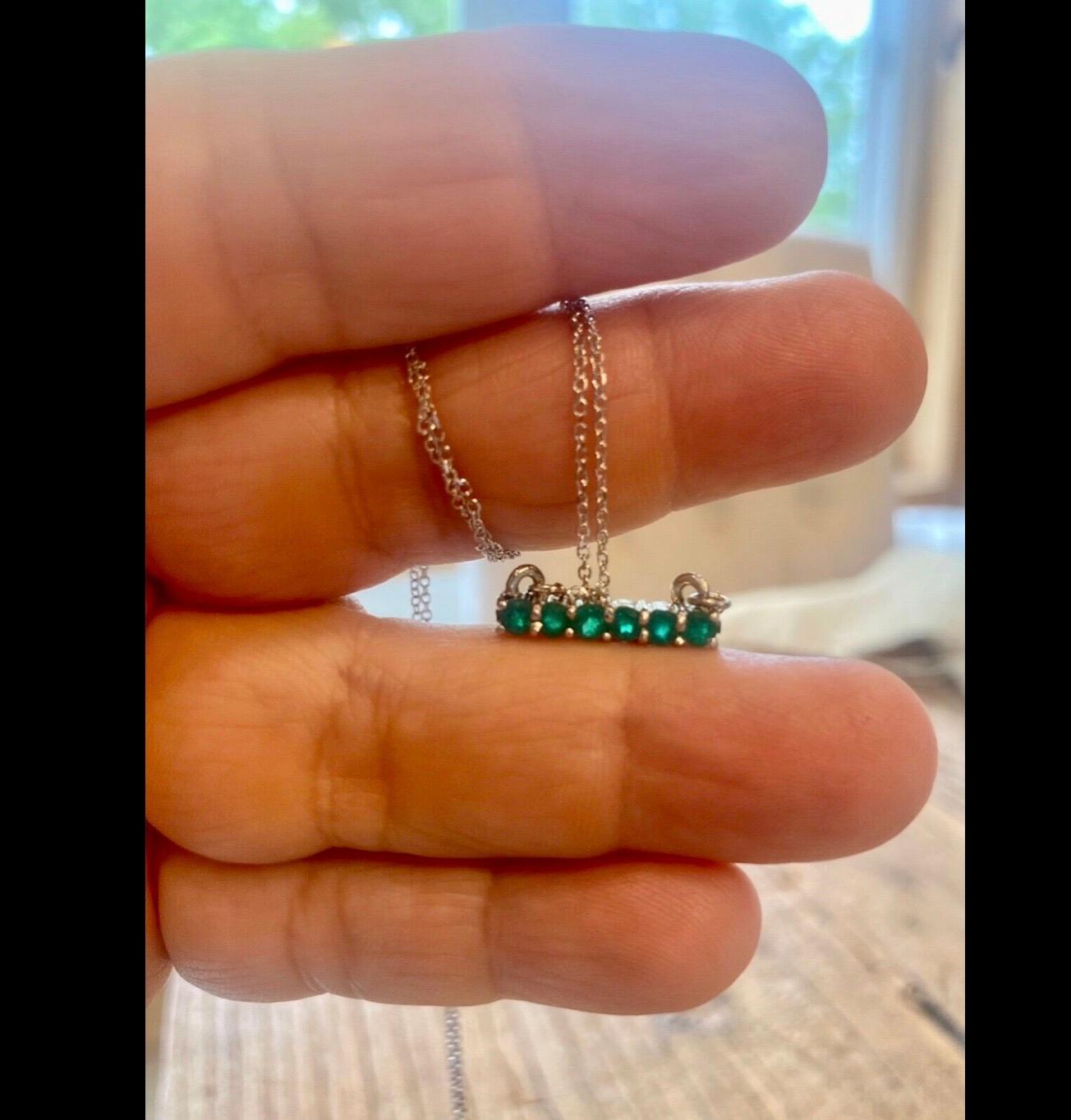 Stunning AAA Colombian Emerald, VS- Clarity. Set in Gorgeous Multistone Pendant Chain Fashion Necklace. Total Colombian Emerald Weight 1.00 Carat. 18K white gold 3.3g. Length 18