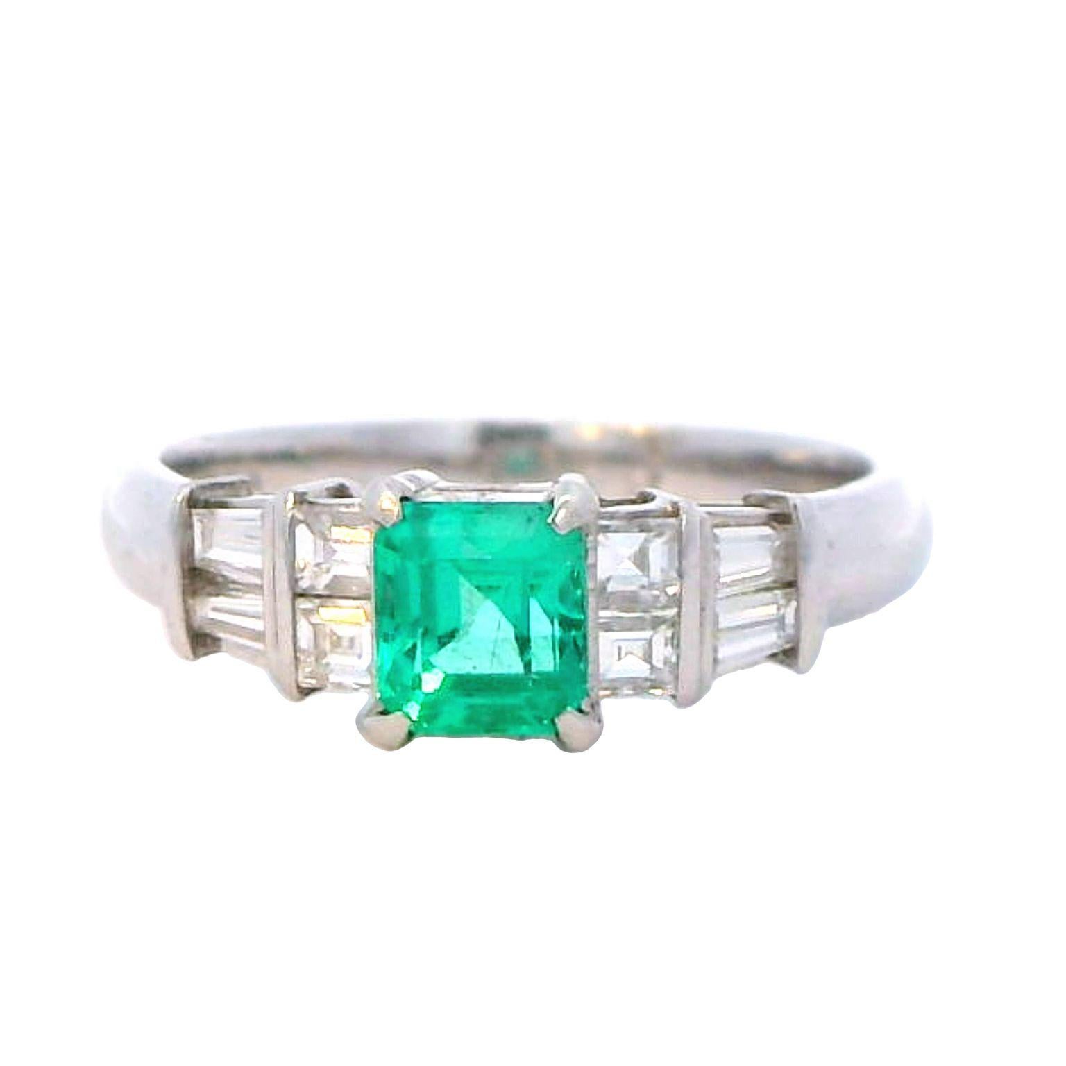 Indulge in the allure of timeless elegance with our Colombian Emerald and Diamond Platinum Ring—a true masterpiece crafted to capture the essence of luxury. This exquisite ring features a vibrant Colombian emerald, set amidst a halo of diamonds