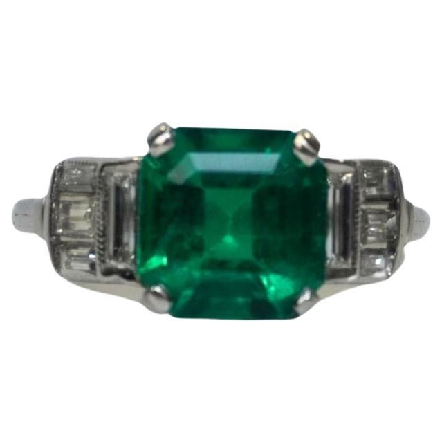 Emerald Weight: 2.13 ct
Diamond Weight: 1.00 ct
Metal: Platinum
Ring Size: 5.75
Shape: Square
Color: Vivid Green
Hardness: 7.5-8
Birthstone: May
Origin: Colombia
Certificate: CD Certified