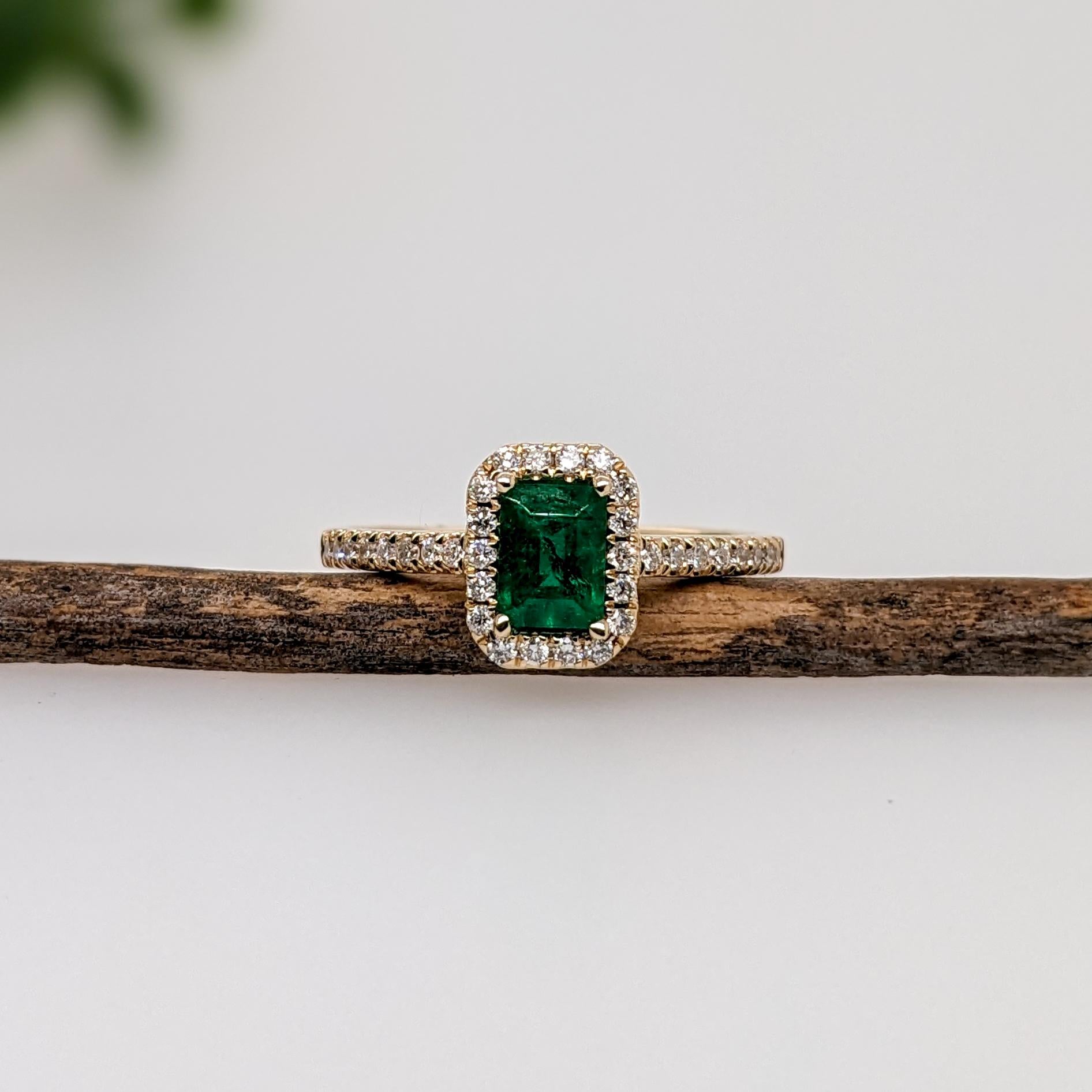 This exquisite ring showcases a vibrant 0.49 carat emerald cut Emerald gemstone, elegantly framed by a halo of natural earth mined diamonds set in solid 14K gold. This Emerald ring makes a beautiful May birthstone gift for your loved