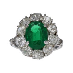 Colombian Emerald Ring with Antique Platinum Diamond Setting
