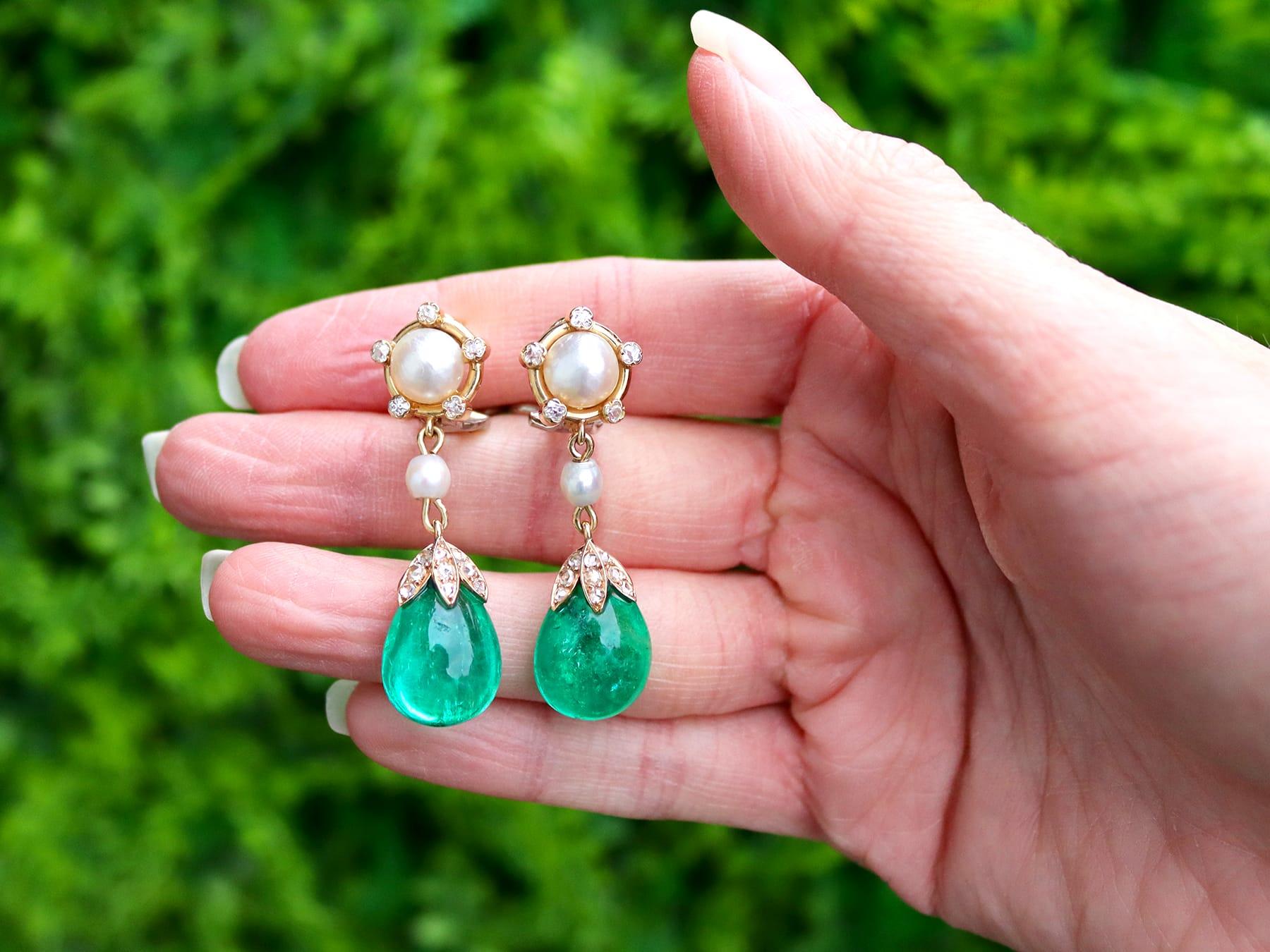 A stunning, fine and impressive pair of antique 13.82 carat Colombian emerald, saltwater pearl and 0.60 carat diamond, 18 karat yellow gold drop earrings; part of our diverse Victorian jewellery collections.

These stunning, fine and impressive
