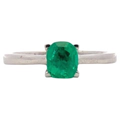 Colombian emerald solitaire engagement ring 18k white gold