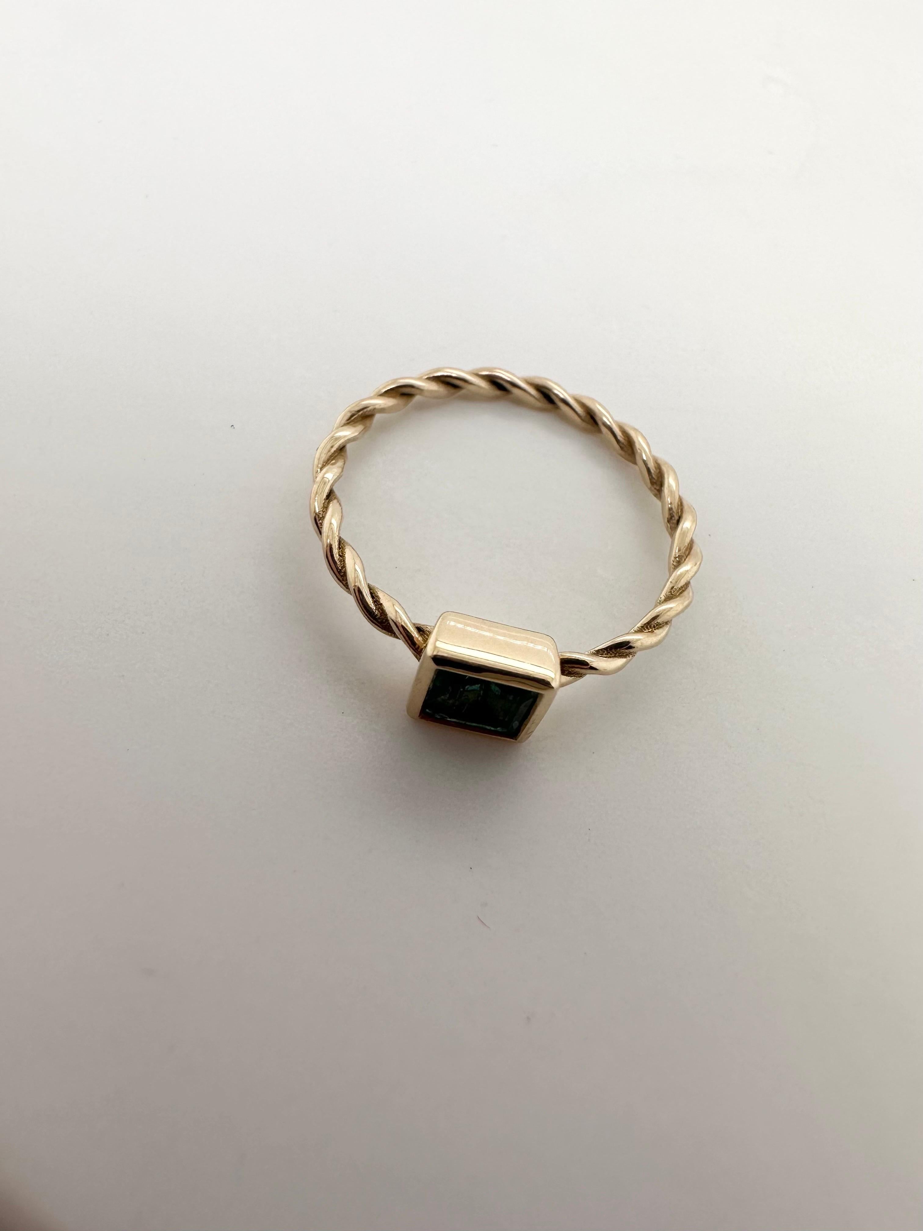 This is a size 3.75 ring ready to ship! THIS RING CANNOT BE RE-SIZED!

Classy Minimalist Ring in 14KT yellow gold, we made the ring with twisted shank and square modern top, the ring can be worn as stackable, engagement, everyday and just any