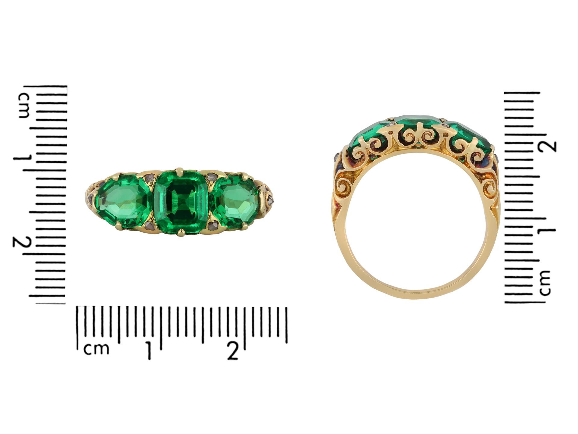 Octagon Cut Antique Colombian Emerald Three Stone Ring, circa 1890. For Sale