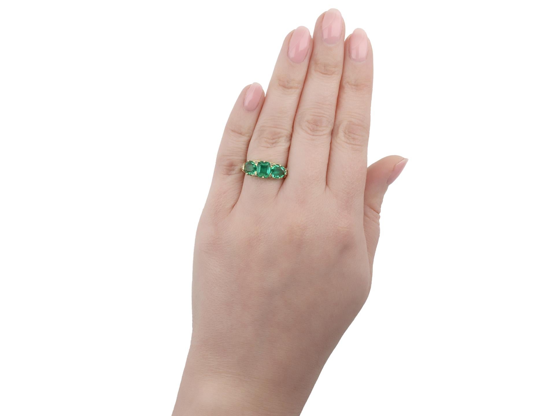 Octagon Cut Antique Colombian Emerald Three Stone Ring, circa 1890. For Sale