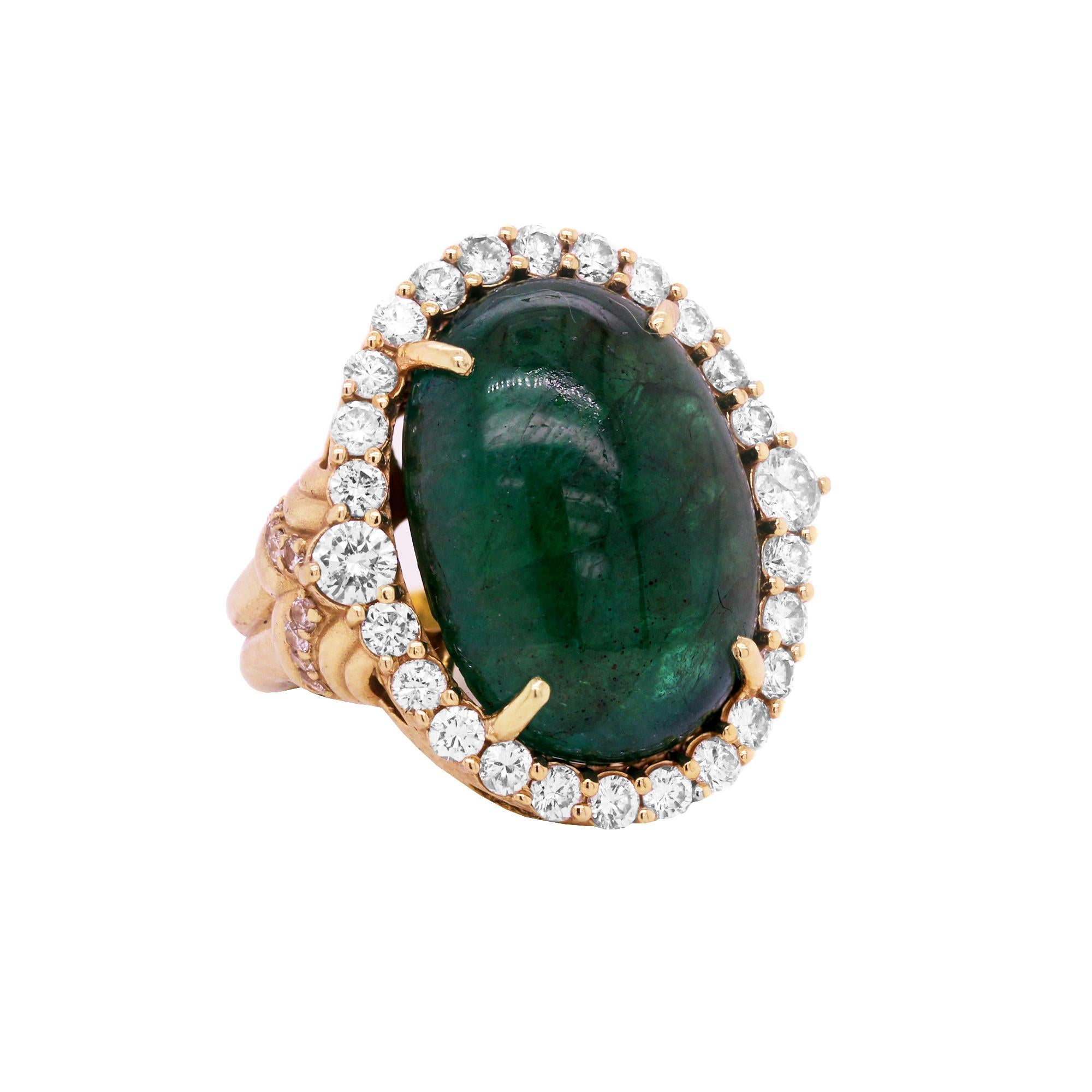 18K Yellow Gold and Diamond Ring with Cabochon cut Colombian Emerald Center

Incredible Emerald with exceptional color. Oval cabochon cut, apprx. 33 carat total weight

2.50 carat G-F color, VS clarity white diamonds total weight

Ring is entirely