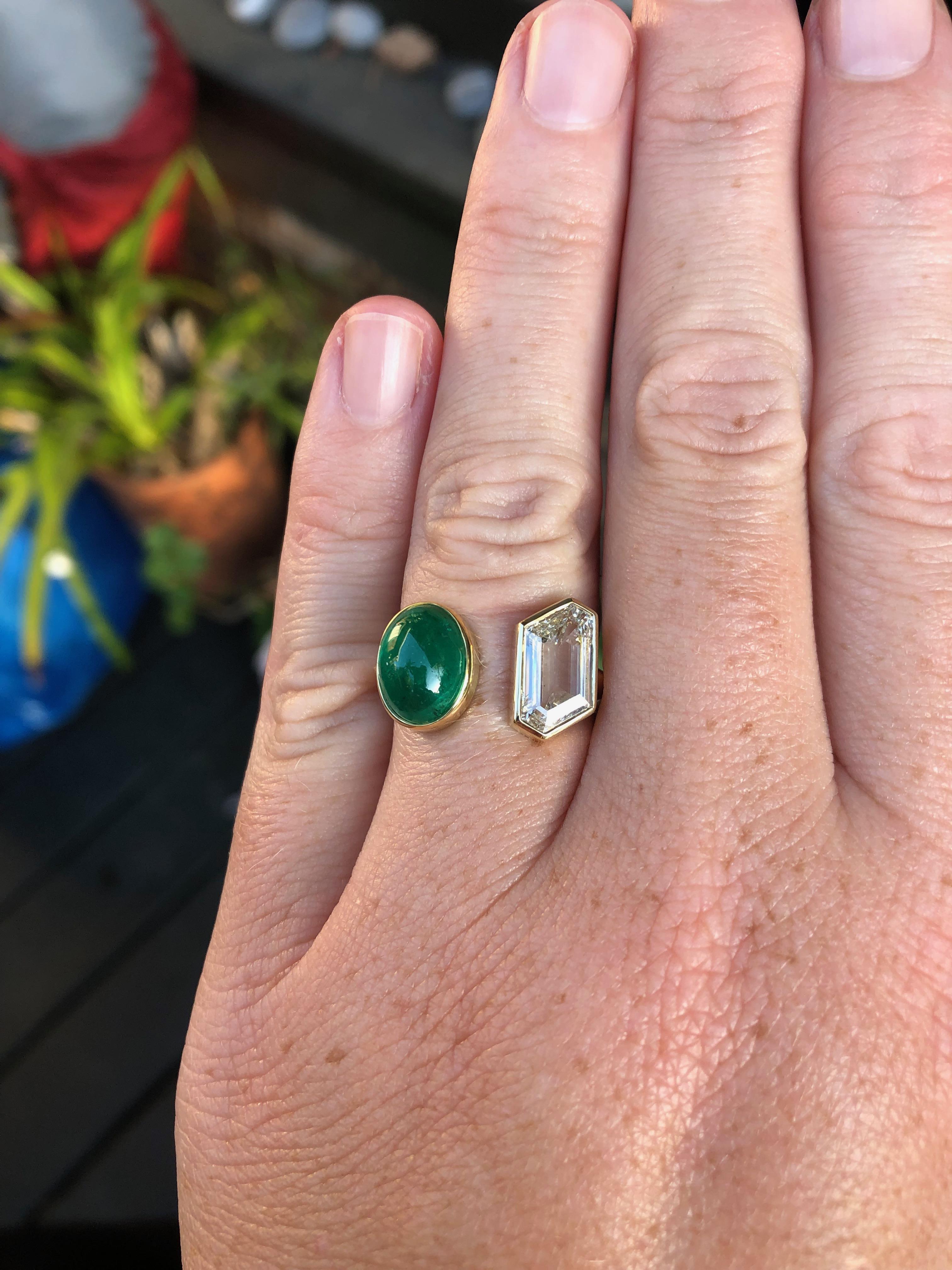3.5 carat Colombian Muzo cabochon emerald and 1.86 carat GIA certified fancy shape diamond hand fabricated in 18 and 22 karat recycled gold. This emerald was sourced directly from Colombia through our collaboration with IEEX Emeralds. This one of a