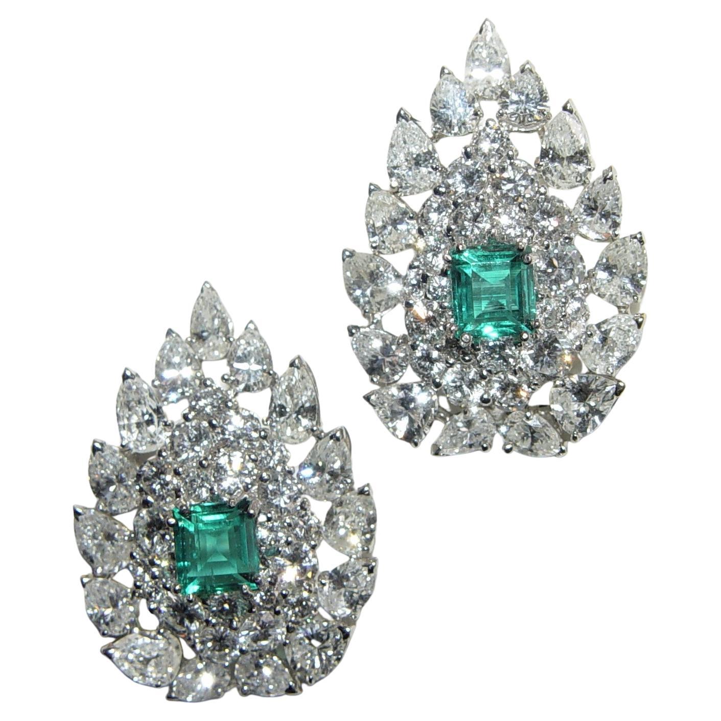 NONE-CLARITY ENHANCED Emeralds are rare! Please check American Gemological Laboratories - The Prestige Gemstone Report # CS 1077839 A and B. According to laboratory gem stone detentions, I have calculated the approximate weight of the Emeralds - it