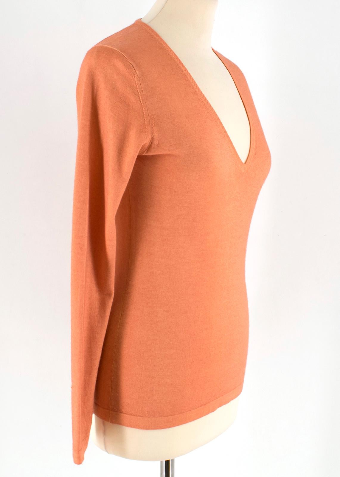 Colombo Peach Cashmere Long sleeve Top

- cashmere peach top
- v neckline
- soft and lightweight 
- long sleeve

Please note, these items are pre-owned and may show some signs of storage, even when unworn and unused. This is reflected within the