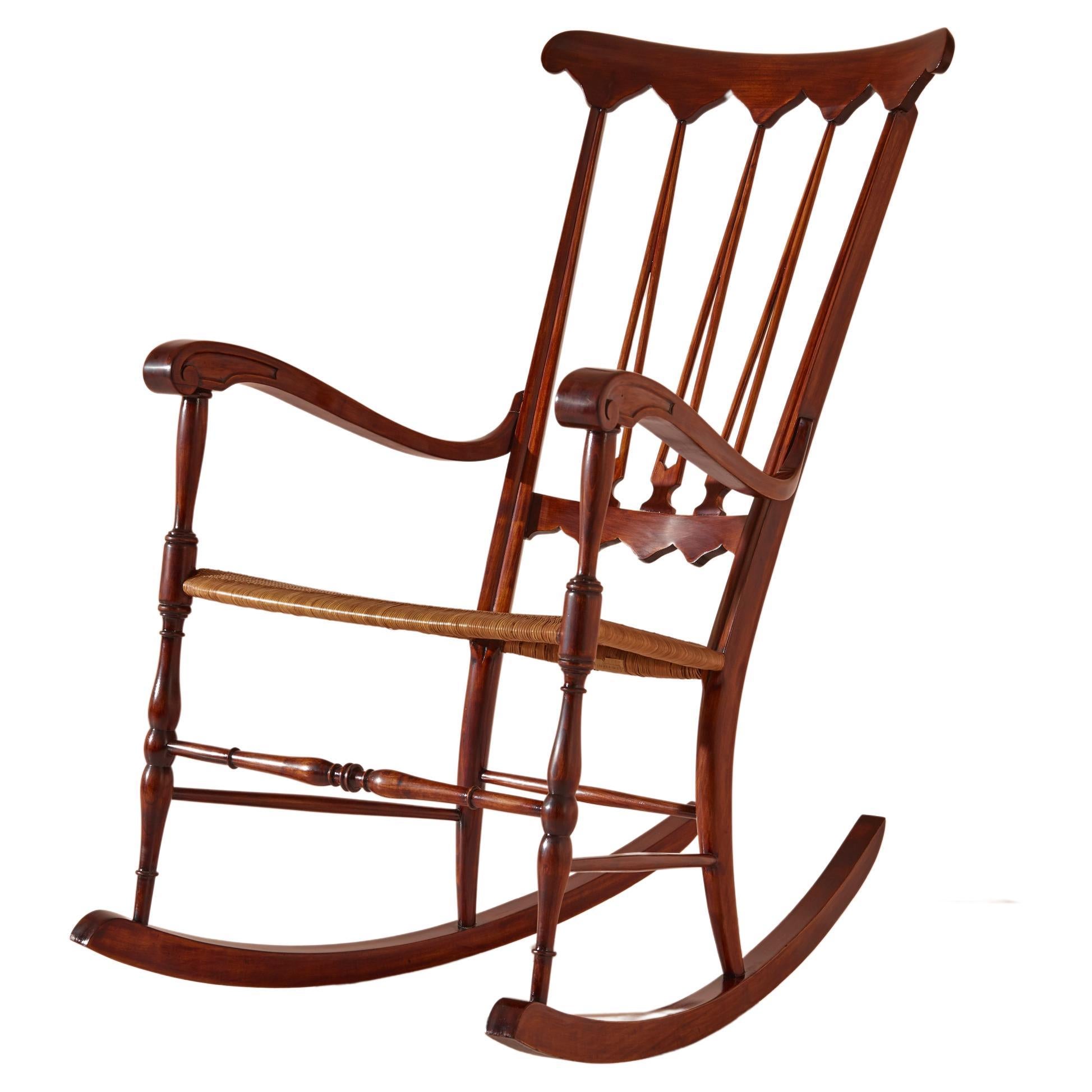 Colombo Sanguineti rocking chair made of beech and woven straw, Chiavari, 1940s For Sale