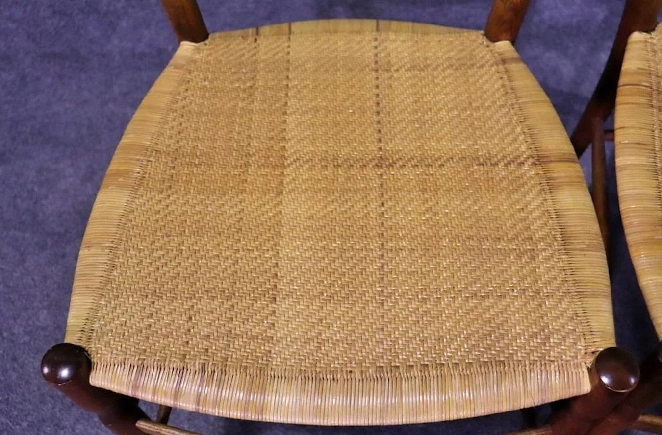 Mid-century vintage pair of wicker seat chairs by Colombo Sanguineti. Italian made wood frame chairs with ladder backs.
Please confirm location NY or NJ