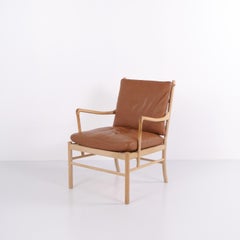 Fauteuil colonial modèle PJ149 en chêne et cuir cognac, par Ole Wanscher