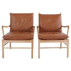 Fauteuil colonial modèle PJ149 en chêne et cuir cognac, par Ole Wanscher