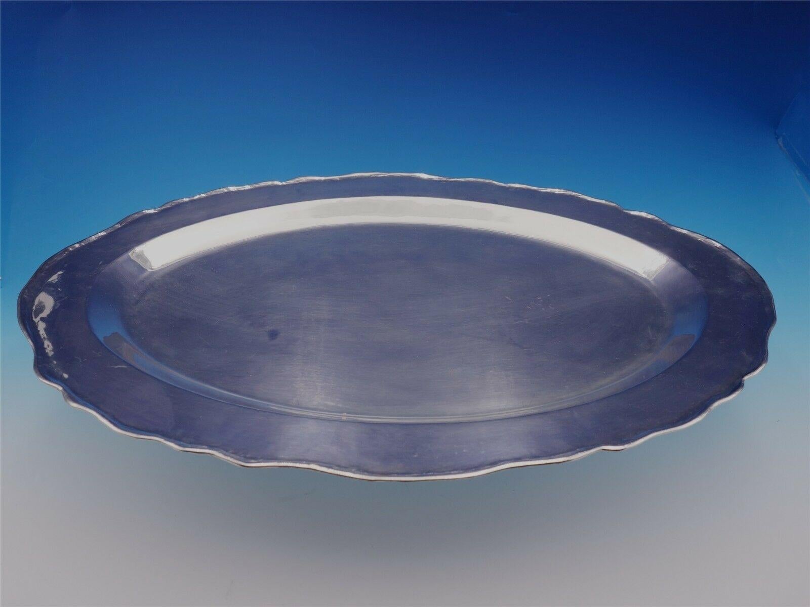 Colonial by Camusso

Marvelous Colonial by Camusso .825 silver oval serving platter. This piece measures 23