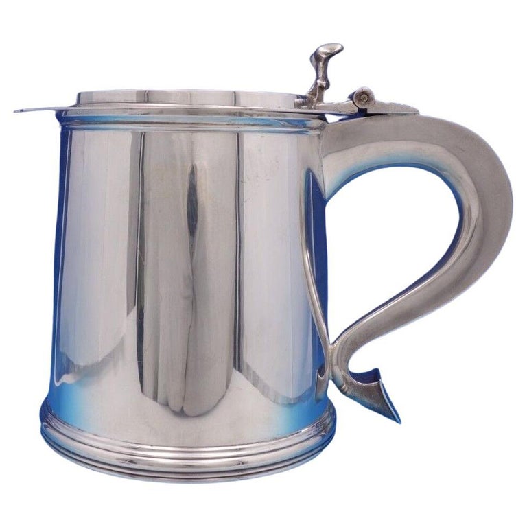 https://a.1stdibscdn.com/colonial-by-tiffany-and-co-sterling-silver-wine-cooler-tankard-massive-7034-for-sale/f_10224/f_306114921664381824010/f_30611492_1664381824295_bg_processed.jpg?width=768