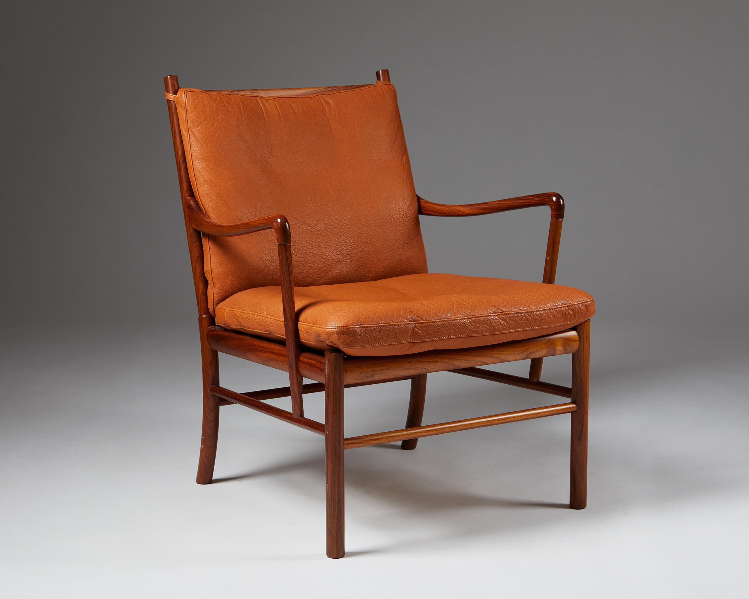 Colonial chair designed by Ole Wanscher, Manufactured by P Jeppesen,
Denmark. 1949.

Rosewood frame and tan leather cushions.

Measurements:
H: 85 cm / 2' 8 3/4