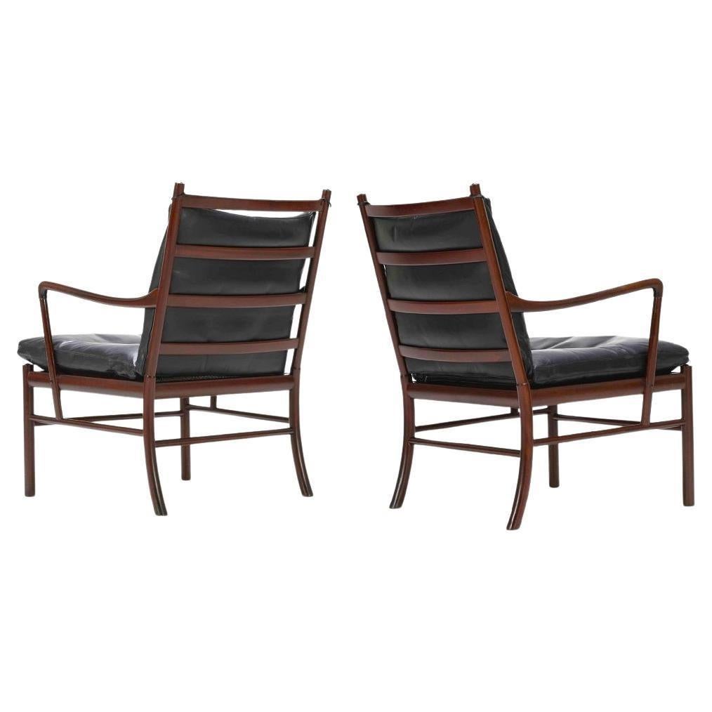 Excellent condition for this nice pair of Colonial chairs in mahogany and original black leather. Delicacy, elegance and quality of execution are what best describes the design of Ole Wanscher, considered one of the greatest names in Danish design.