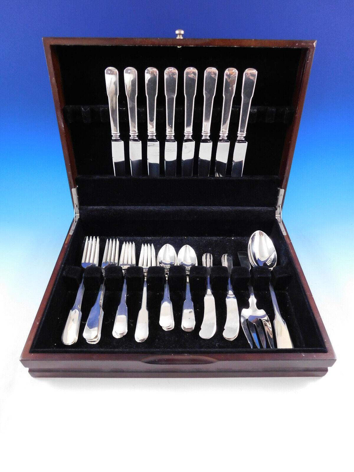 Colonial Fiddle by Watson sterling silver Flatware set, 42 pieces. This set features a classic, timeless, unadorned fiddle shaped handle and includes:


8 knives, 9