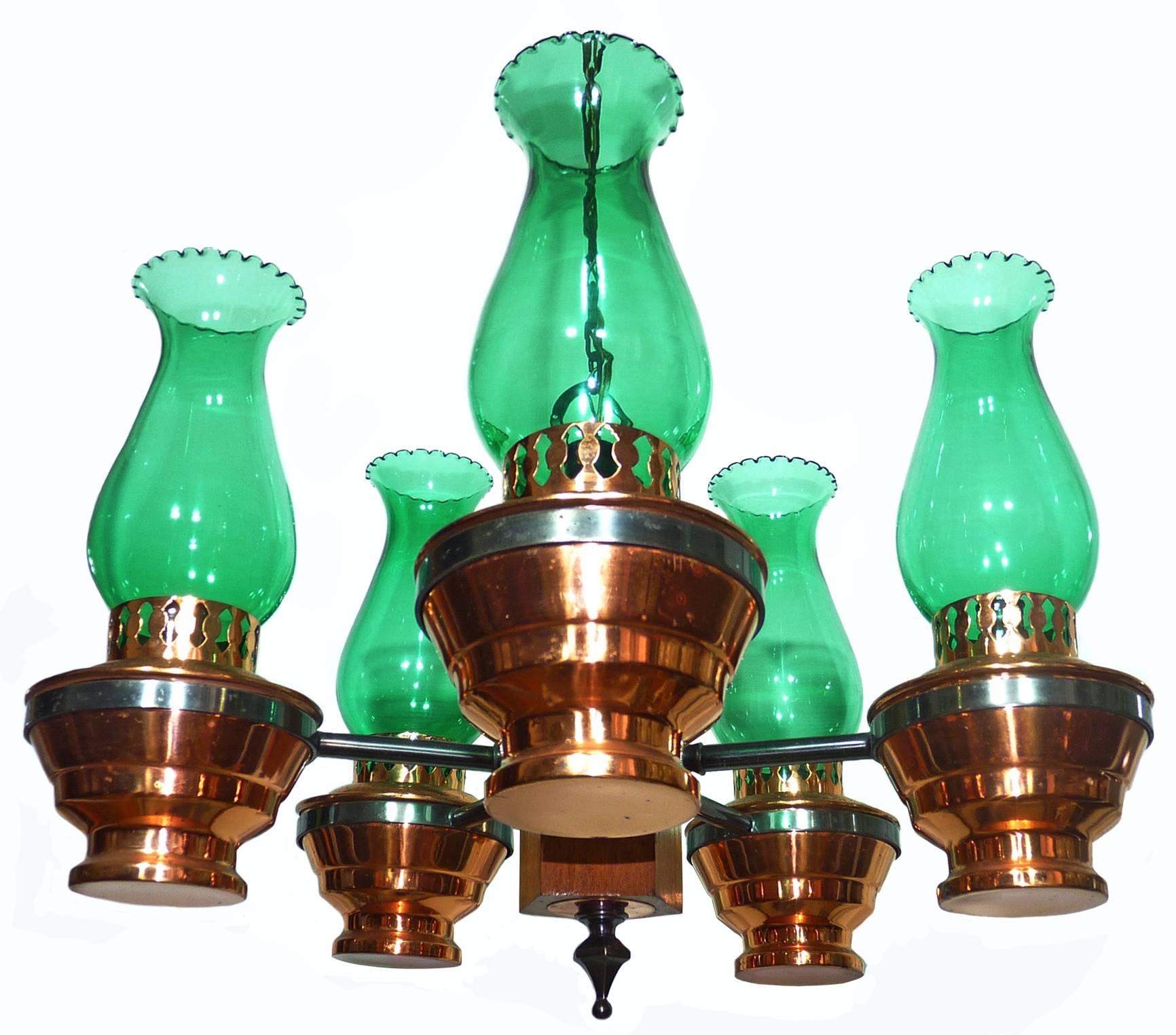 Vintage French colonial copper oil lamp chandelier with wood and green glass shades
Beautiful age patina
Measures:
Diameter 20 in / 50 cm
Height 32 in / 80 cm (chain=20 cm/ 8 in)
Glass shades 4 in (10 cm) / 8 in (20 cm)
Weight 11 lb. (5